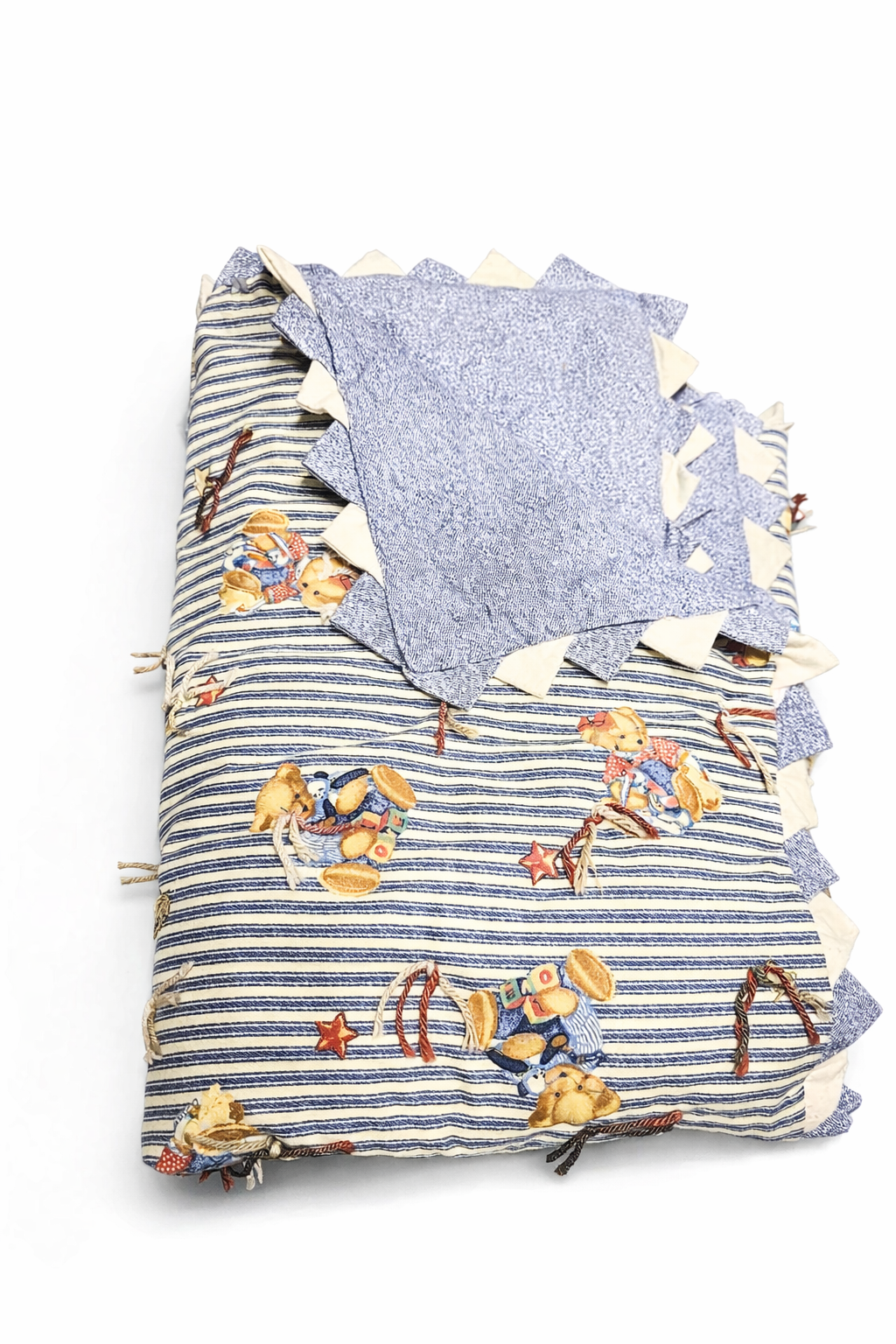 Teddy bear tied blanket